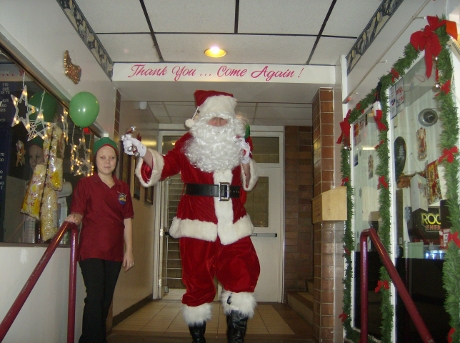 Santa making his way into the entertainment centre.