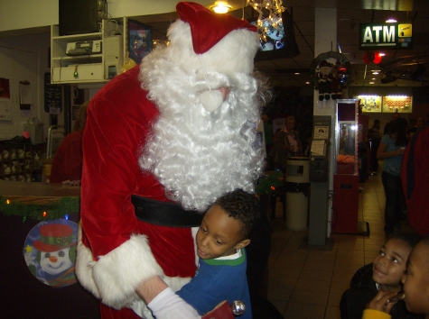 Some children showing their love for Santa.